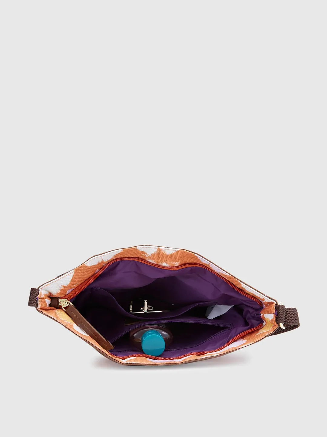 Caprese Enora Large Rust Sling Bag