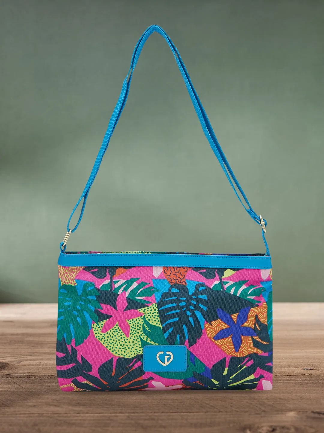 Caprese Octavia Large Fuchsia Sling Bag